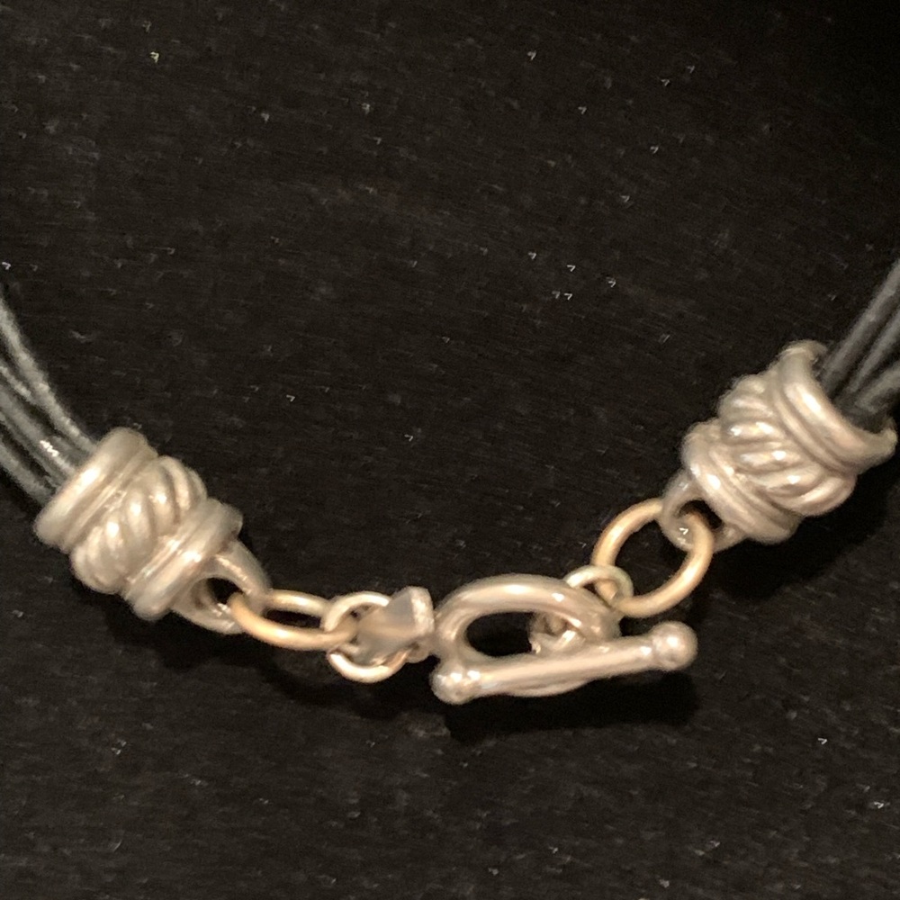 Silver artisan pendant necklace